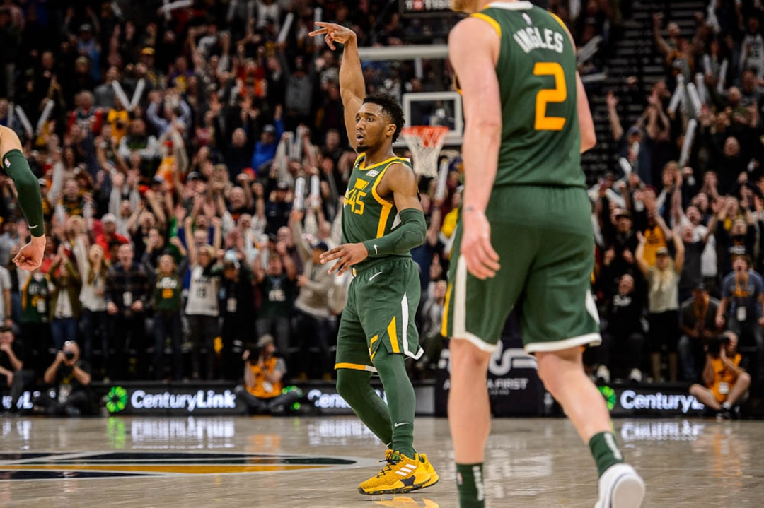 (Trent Nelson | The Salt Lake Tribune)  Utah Jazz guard Donovan Mitchell (45) hits a three-pointer as the Utah Jazz host the Milwaukee Bucks, NBA basketball in Salt Lake City on Saturday March 2, 2019.