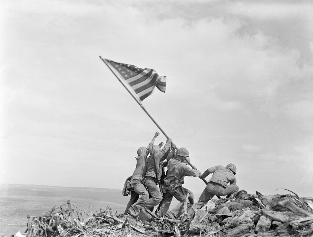 (Joe Rosenthal | AP file photo)

In this Feb 23, 1945, photo, U.S. Marines of the 28th Regiment, 5th Division, raise the American flag atop Mt. Suribachi, Iwo Jima, Japan.