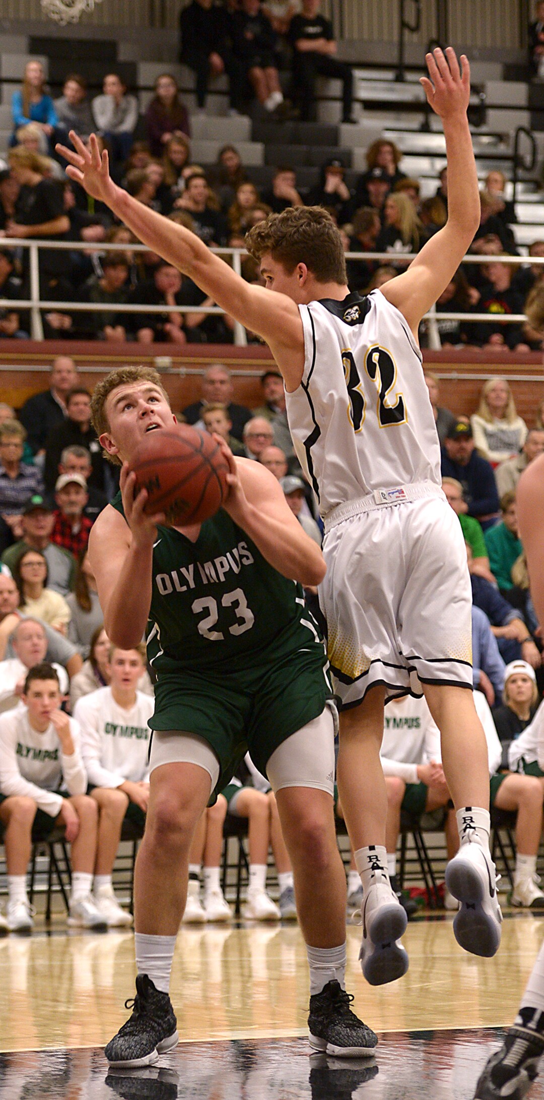 (Leah Hogsten  |  The Salt Lake Tribune) Olympus' Harrison Creer looks for the shot. Olympus High School defeated Highland High School 86-54 during their basketball game, Tuesday, February 6, 2018.