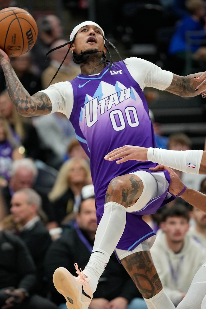 (Francisco Kjolseth  | The Salt Lake Tribune) Utah Jazz guard Jordan Clarkson (00) makes a fading shot as the Utah Jazz host the Orlando Magic during NBA basketball at the Delta Center in Salt Lake City on Saturday, February. 1, 2025.
