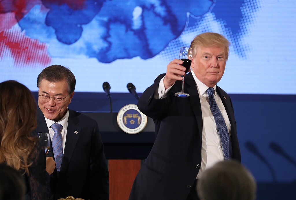 U.S. President Donald Trump and South Korean President Moon Jae-in toast at the start of a dinner at the Blue House in Seoul, South Korea, Tuesday, Nov. 7, 2017. Trump is on a five country trip through Asia traveling to Japan, South Korea, China, Vietnam and the Philippines. (AP Photo/Andrew Harnik)