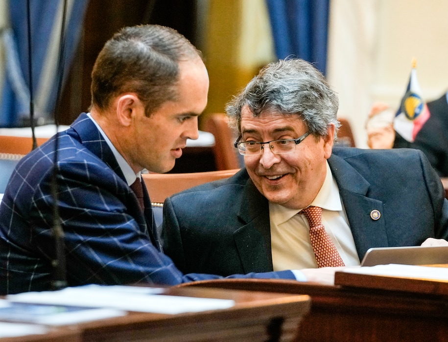 (Leah Hogsten | The Salt Lake Tribune)  l-r Sen. Michael McKell, R-Spanish Fork speaks with Sen. John Johnson, R-Ogden, during Senate floor time at the Legislative Session, Jan. 25, 2022. 