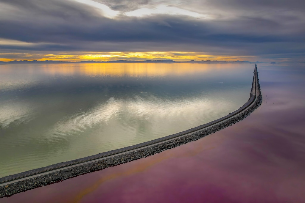 (Francisco Kjolseth  | The Salt Lake Tribune) The Union Pacific rock-fill railroad causeway stretches 20 miles across the Great Salt Lake, splitting the lake in two on Friday, Nov. 22, 2024.