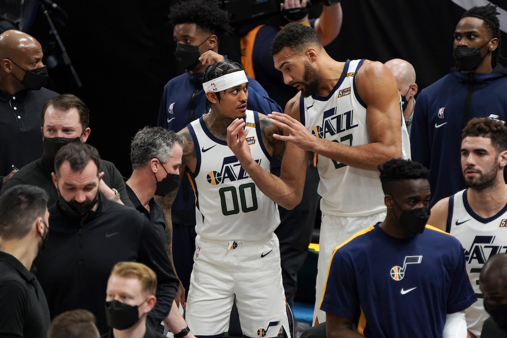 (Leah Hogsten | The Salt Lake Tribune) Utah Jazz guard Jordan Clarkson (00) and Utah Jazz center Rudy Gobert (27) talk play during a timeout as the Utah Jazz host the Memphis Grizzlies, Mar. 26, 2021 at Vivint Arena. 