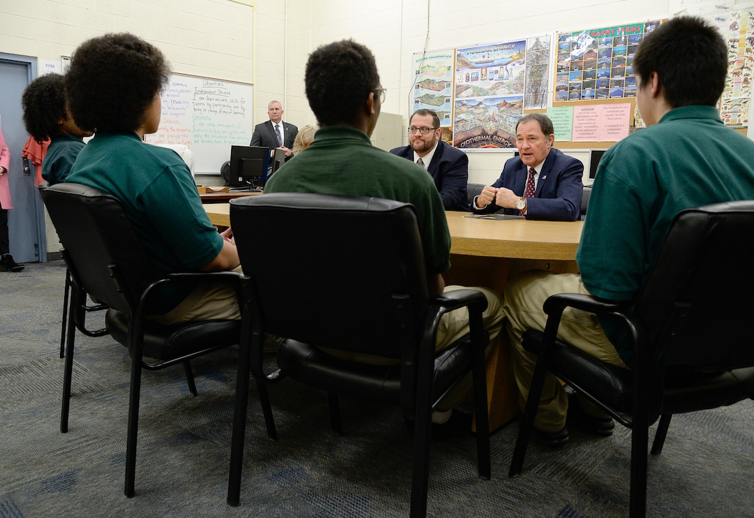 (Francisco Kjolseth  |  The Salt Lake Tribune) Juvenile Justice Services Director Brett Peterson, at Decker Youth Center in West Valley City, center left, is joined by Gov. Gary Herbert as they speak with some of the youth working through the program on Wednesday, Jan. 15, 2020, during a tour to discuss its success after juvenile justice reforms were passed in 2017.
