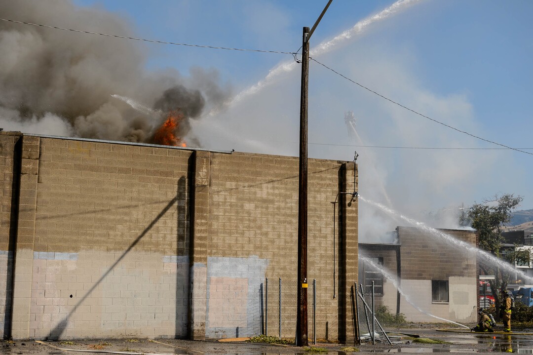 (Trent Nelson  |  The Salt Lake Tribune) Crews work to extinguish a fire at 800 South 200 West in Salt Lake City on Wednesday, Sept. 9, 2020.