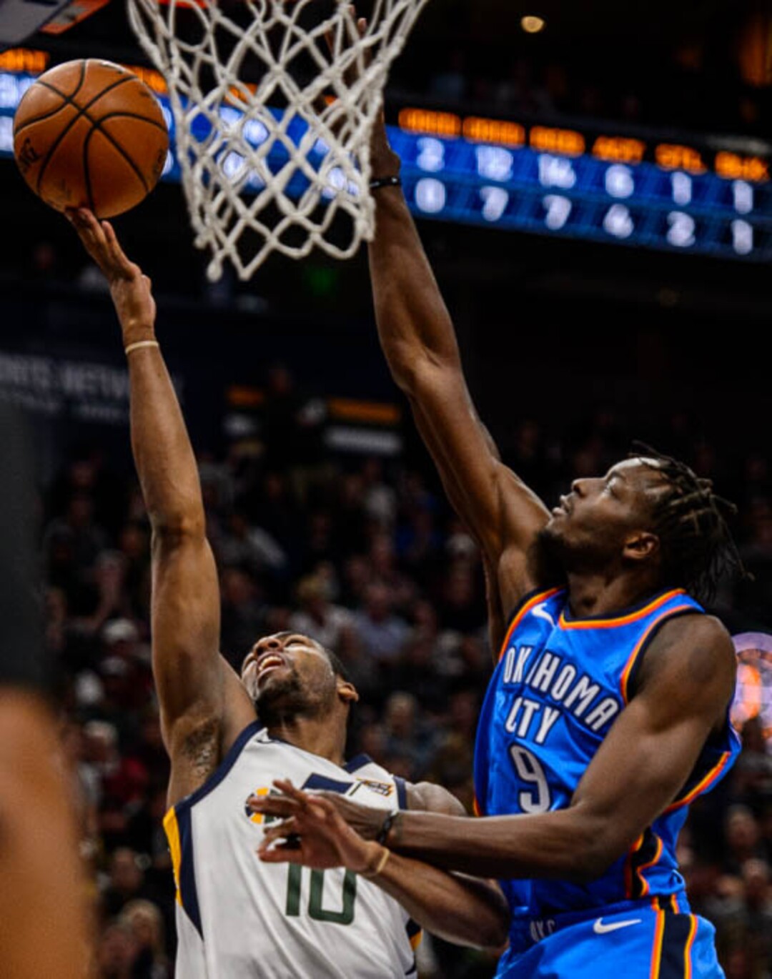 (Trent Nelson | The Salt Lake Tribune)  Utah Jazz guard Alec Burks (10) shoots with Oklahoma City Thunder forward Jerami Grant (9) defending as the Utah Jazz host the Oklahoma City Thunder, NBA basketball in Salt Lake City, Saturday December 23, 2017.