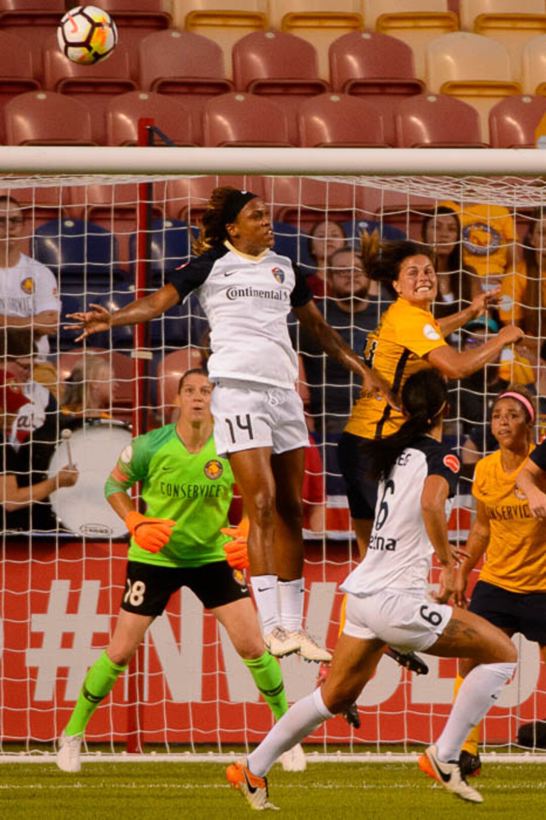 (Trent Nelson | The Salt Lake Tribune)  Utah Royals FC host North Carolina Courage, NWSL soccer at Rio Tinto Stadium in Sandy, Friday July 20, 2018. North Carolina Courage forward Jessica McDonald (14) and Utah Royals FC forward Katie Stengel (24). Utah Royals FC goalkeeper Nicole Barnhart (18) at rear.