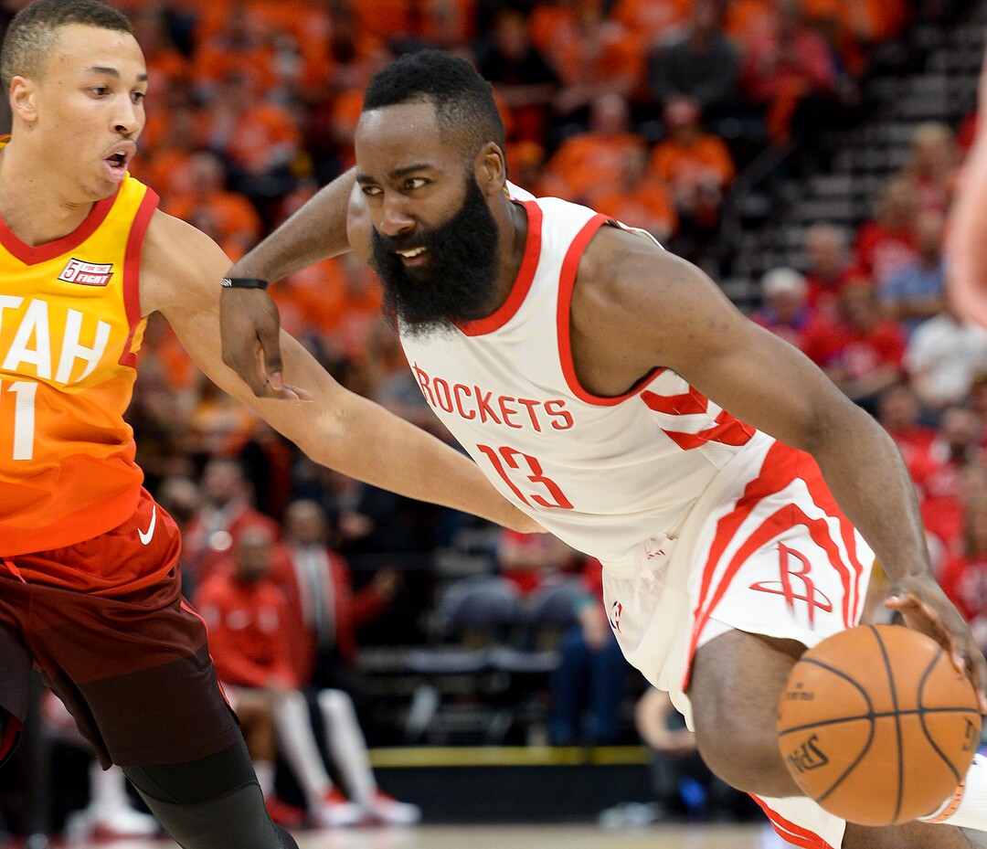 (Leah Hogsten  |  The Salt Lake Tribune)  Houston Rockets guard James Harden (13) drives around Utah Jazz guard Dante Exum (11).  The Houston Rockets defeated the Utah Jazz 113-92 in Game 3 of an NBA basketball second-round playoff series Friday, May 4, 2018 in Salt Lake City.