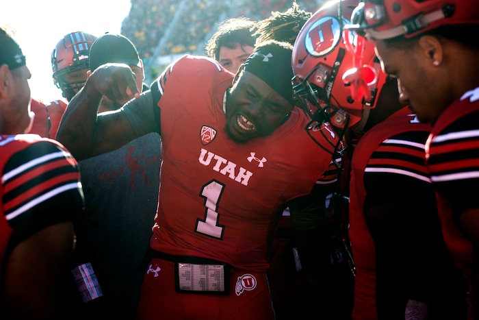 (Chris Detrick  |  The Salt Lake Tribune)  Utah Utes quarterback Tyler Huntley (1) gets frustrated as he talks with teammates during third quarter of the game at Rice-Eccles Stadium Saturday, October 21, 2017.  Arizona State Sun Devils defeated Utah Utes 30-10.