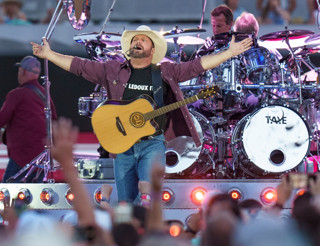 (Leah Hogsten | The Salt Lake Tribune) Country star Garth Brooks performs with his band during his Stadium Tour Friday, June 17, 2022 at Rice-Eccles Stadium.