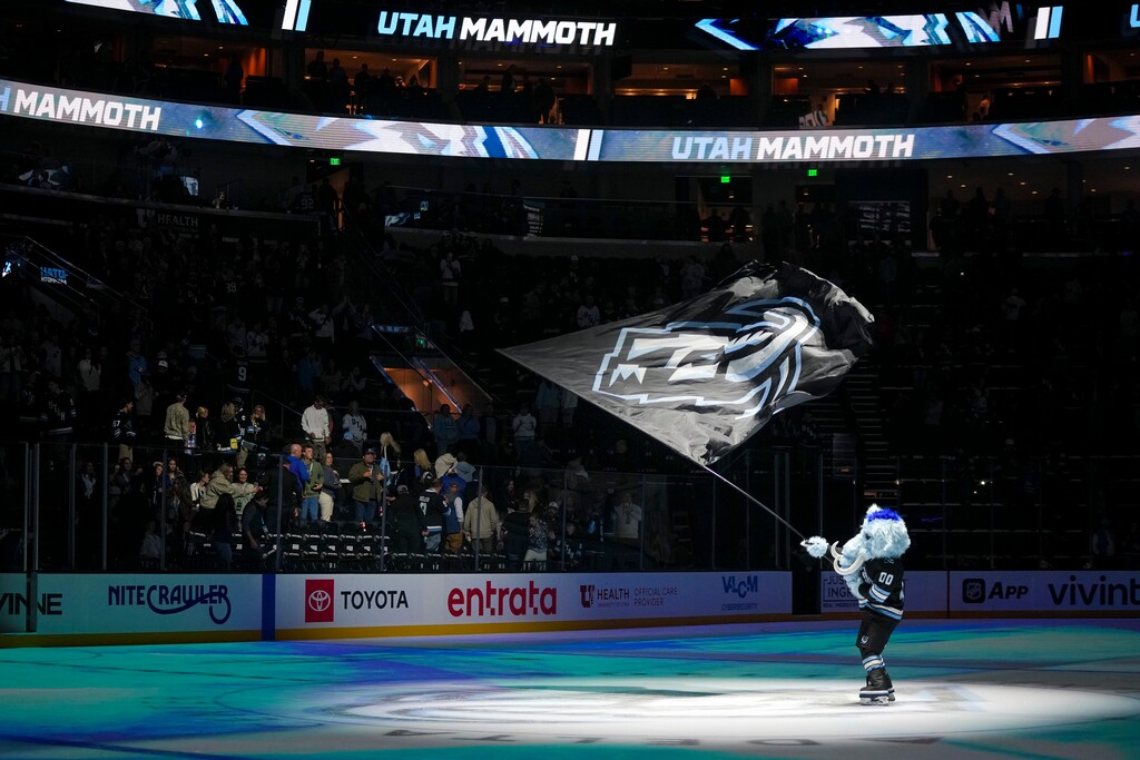 (Bethany Baker  |  The Salt Lake Tribune) Tusky, the mascot for Utah Mammoth, waves a flag at center ice after the game against the San Jose Sharks at Delta Center in Salt Lake City on Friday, Oct. 17, 2025.