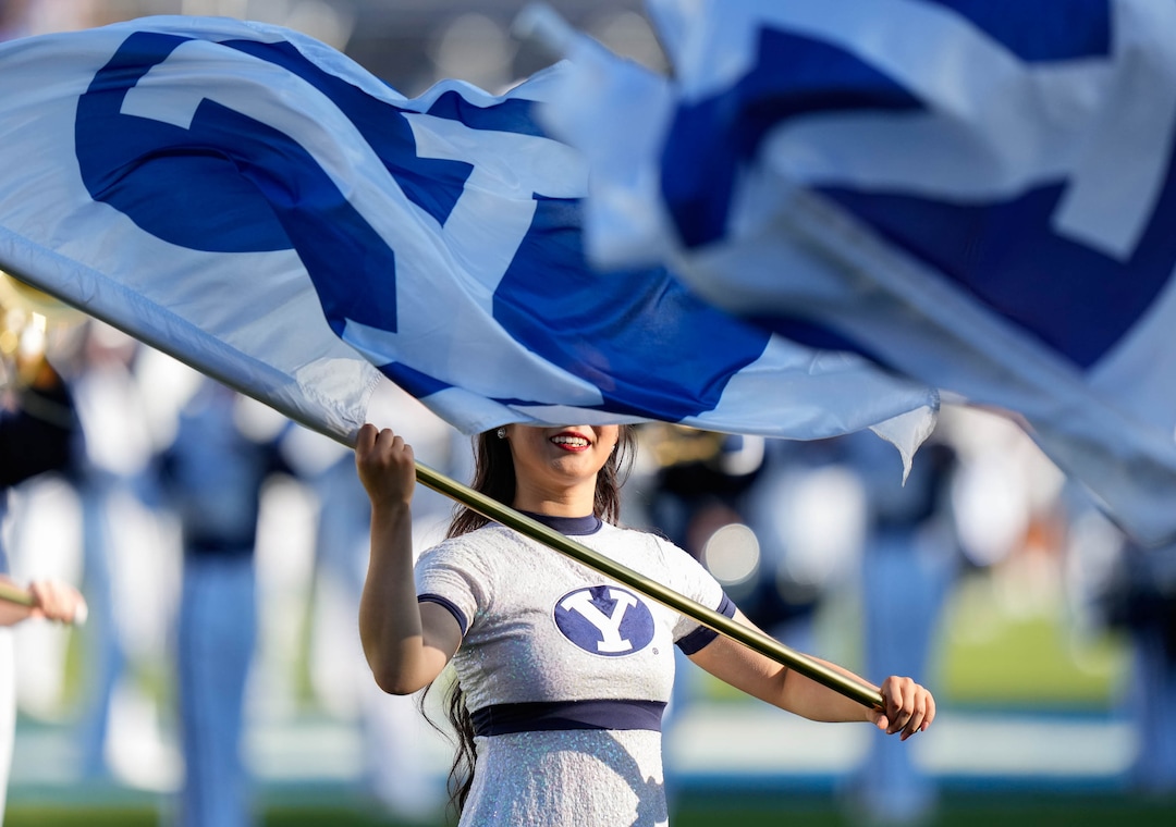 (Francisco Kjolseth | The Salt Lake Tribune) The BYU color guard takes to the field before the start of their NCAA college football game against Utah Tech, Saturday, Sept. 5, 2026, at LaVell Edwards Stadium in Provo.
