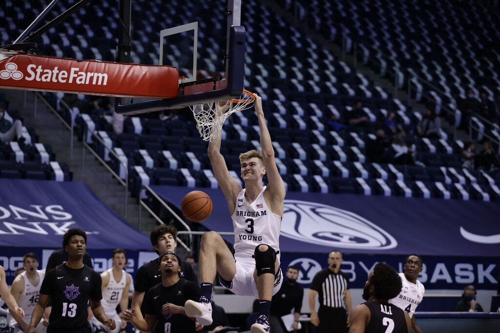 BYU's Matt Haarms completes a dunk in the second half against Portland on Thursday. The senior scored a game-high 23 points on 9 of 9 shooting.