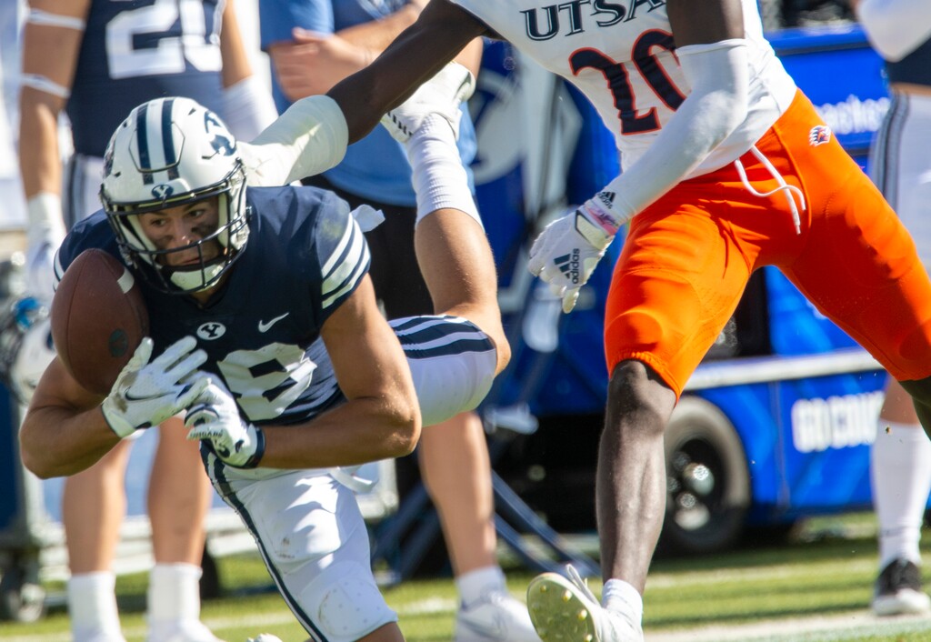 (Rick Egan  |  The Salt Lake Tribune)    Brigham Young Cougars wide receiver Gunner Romney tries to hang on a long pass, as UTSA Roadrunners cornerback Tariq Woolen (20) defends, in football action between the Brigham Young Cougars and the UTSA Roadrunners, at Lavell Edwards stadium, Saturday, Oct. 10, 2020.