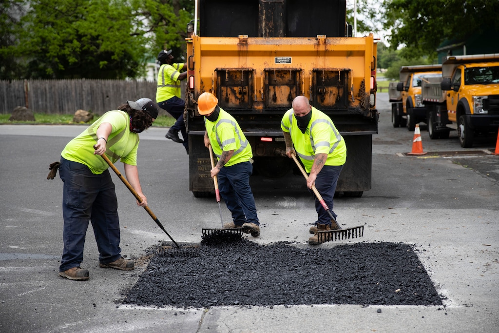(AP Photo/Matt Rourke)

Employees of the Allentown, Pennsylvania, streets department patch a hole near Jordan Park in Allentown.