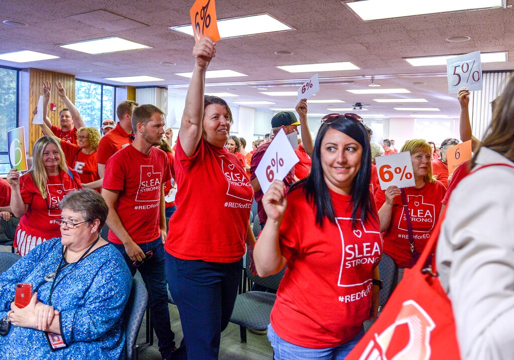 (Leah Hogsten | The Salt Lake Tribune) Teachers walk out of the public comment period at the Salt Lake City School District meeting regarding salary negotiations, June 4, 2019. More teachers are leaving Utah classrooms and one of the biggest reasons they cite is low pay. The state now has a shortage of 1,600 educators with the imbalance expected to get worse.