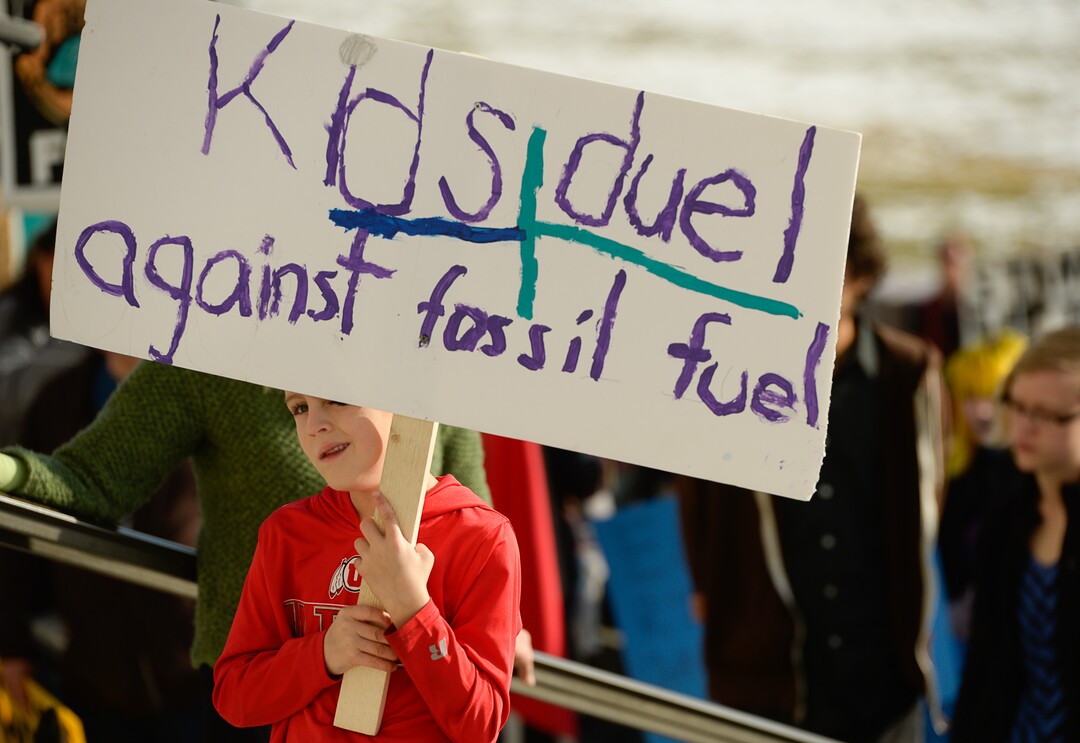 (Francisco Kjolseth  |  The Salt Lake Tribune)  Blake Birrell, 6, joins the fight along with Fridays For Future, Utah Youth Environmental Solutions, and partners as they strike in opposition to UtahÕs final oil and gas lease sale of 2019 that will auction off public lands and further fossil fuel development during a rally on the steps of the Utah Capitol on Friday, Dec. 6, 2019.