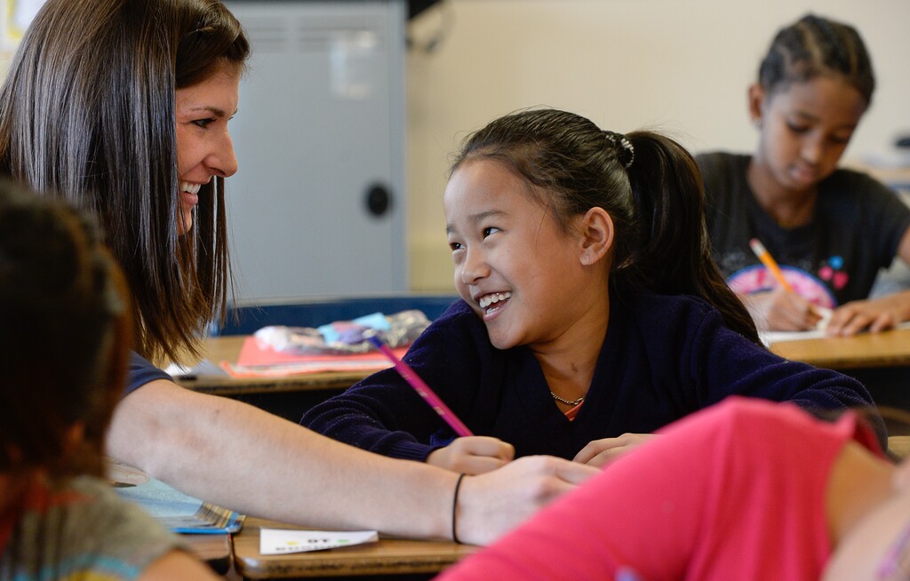 Francisco Kjolseth | The Salt Lake TribuneErika Linford works with students on reading comprehension in her third grade class at Lincoln Elementary. A new state program will focus on trying to turn things around with struggling schools. 