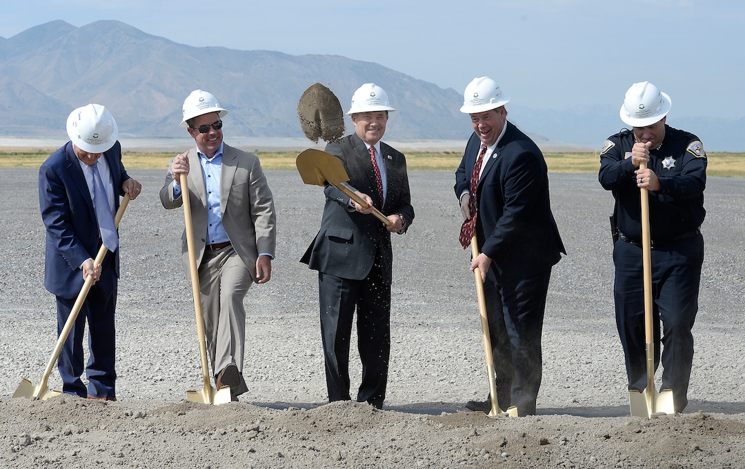 (Scott Sommerdorf   |  The Salt Lake Tribune)   Utah Governor Gary Herbert, center, turns dirt along with other dignitaries at the site of the new prison, Wednesday, August 16, 2017. Rep. Brad Wilson, R-Layton, is left of the Governor, Rep. Eric Hutchings, R-Kearns, and Utah Dept. of Corrections Executive Director Rollin Cook are to the right.