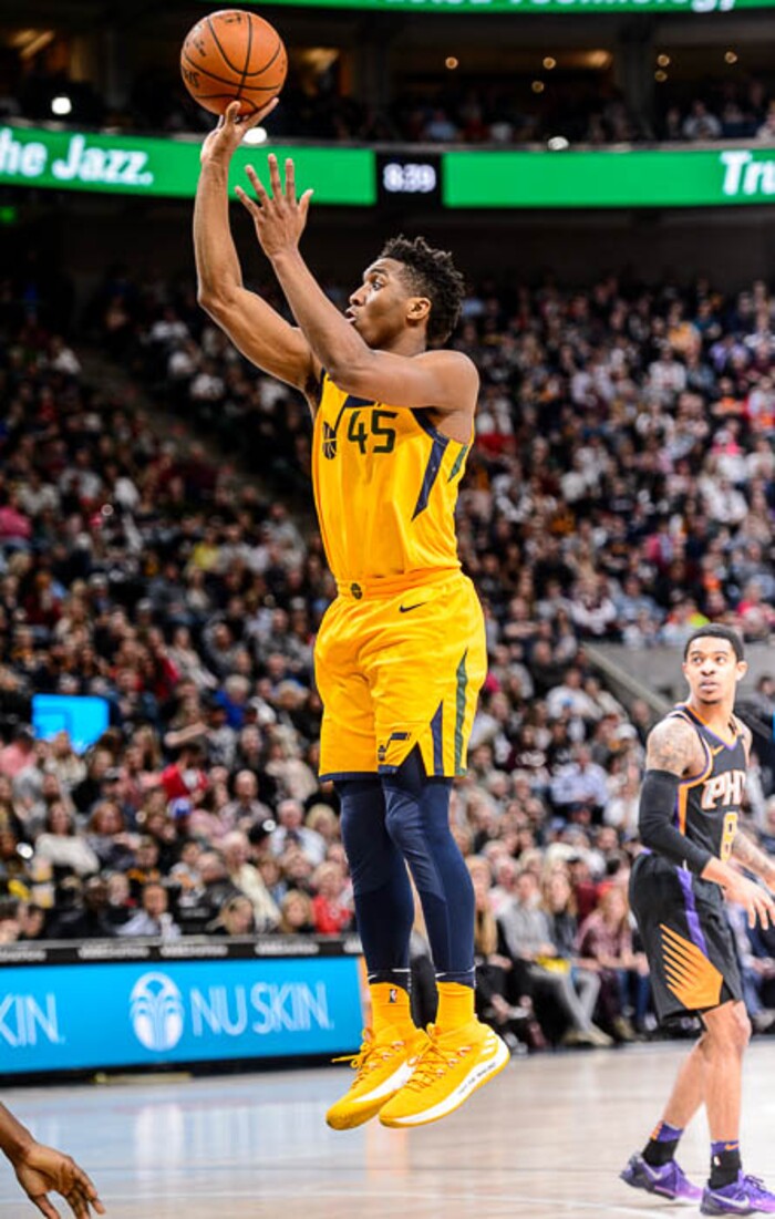 (Trent Nelson | The Salt Lake Tribune)  Utah Jazz guard Donovan Mitchell (45) scores as the Utah Jazz host the Phoenix Suns, NBA basketball in Salt Lake City, Wednesday Feb. 14, 2018.