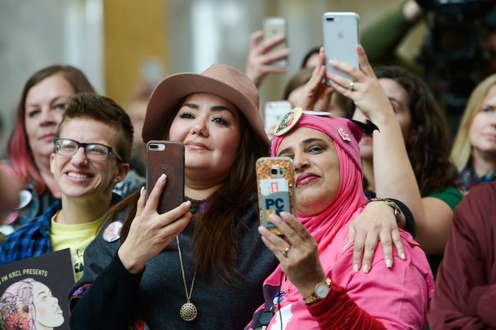 (Leah Hogsten | The Salt Lake Tribune) Faces in the crowd at Amplifying WomenÕs Voices rally to celebrate International WomenÕs Day at the Utah State Capitol Rotunda, hosted by KRCL Thursday, March 8, 2018.