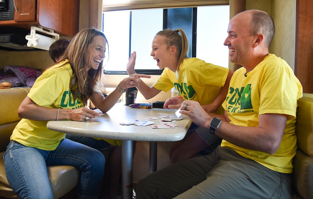 (Francisco Kjolseth  |  The Salt Lake Tribune)  Lt. Gov. Spencer Cox gets called out by his wife Abby for cheating during a speed round of the card game Blink as they pass the time with their daughter Emma Kate, 12, between campaign stops while on the road in the family RV on Tuesday, July 30, 2019.