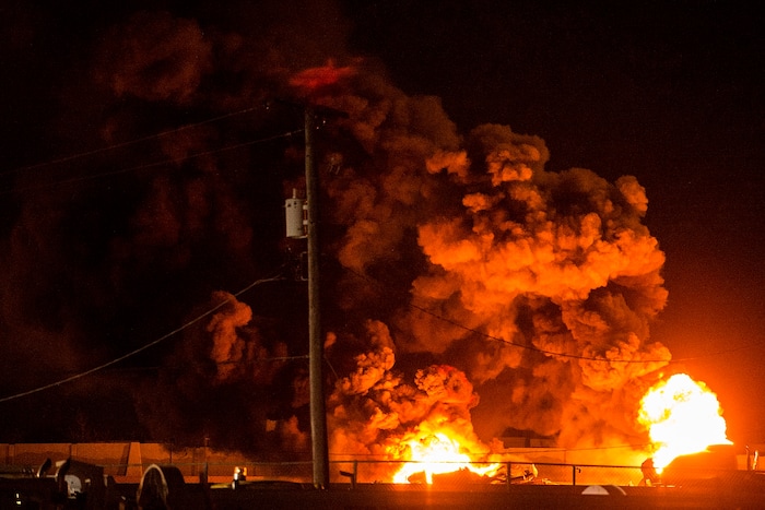 (Chris Detrick  |  The Salt Lake Tribune)  A semitrailer hauling thousands of gallons of fuel burns on Interstate-15 in Midvale Thursday, January 18, 2018.   Lt. Todd Royce of the Utah Highway Patrol said the truck was southbound on the interstate at 7500 South at 7:20 p.m. when a tire caught fire, sending flames toward the tanks.
