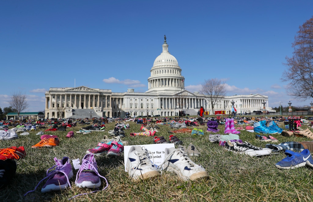 7,000 pairs of shoes, one for every child killed by gun violence since the Sandy Hook school shooting, were placed on the Capitol lawn by Avaaz, a U.S.-based civic organization, on Capitol Hill in Washington, Tuesday, March 13, 2018. (AP Photo/Pablo Martinez Monsivais)