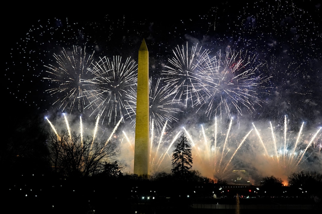 Fireworks light up the sky by the Washington Monument during inauguration ceremonies Wednesday, Jan. 20, 2021, in Washington. (AP Photo/Evan Vucci)