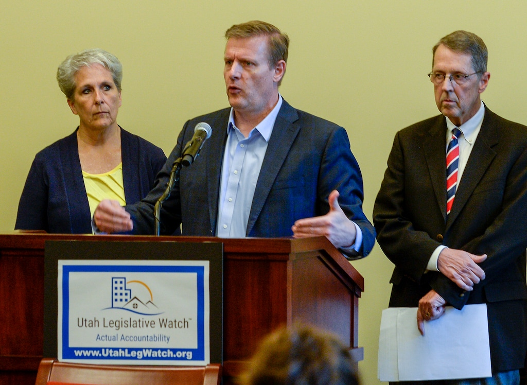(Leah Hogsten  |  The Salt Lake Tribune) Brett Hastings, center with Utah Legislative Watch calls for a restructuring of the Utah tax system and a cut to the state budget, Tuesday at the Capitol. Utah Legislative Watch held a press conference, Tuesday, May 21, 2019, to formally announce the creation of Utah Legislative Watch and to call for tax reform.
