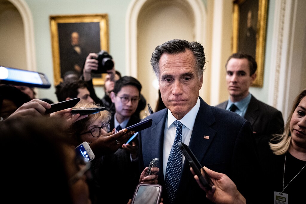  (Erin Schaff  |  The New York Times) Sen. Mitt Romney talks to reporters at the Capitol before the start of the day's session of the Senate impeachment trial of President Donald Trump in Washington on Wednesday, Jan. 29, 2020.