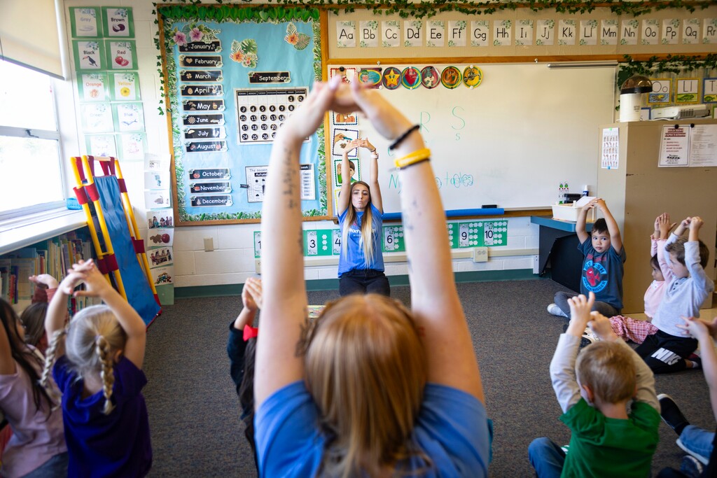 (Kyle Green  |  Associated Press file photo) Teacher Abi Hawker leads preschoolers in learning activities at Hillcrest Developmental Preschool in American Falls, Idaho, on Thursday, Sept. 28, 2023. A grassroots effort to support children and families led the town to rally around a simple mantra — “read, talk, play.” The town has seen improvements in preschool access and kindergarten readiness.