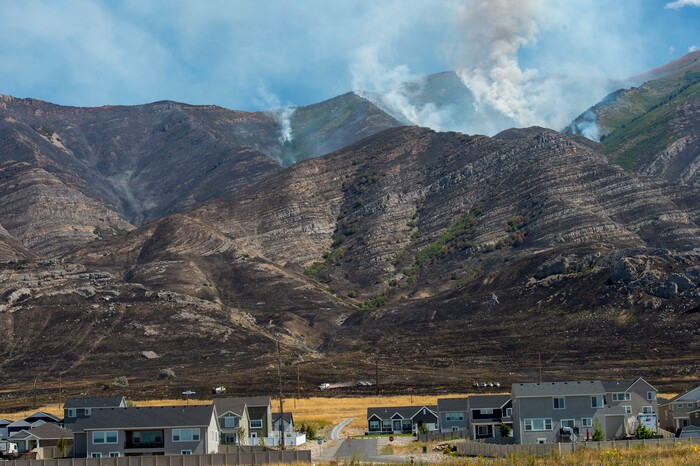 (Rick Egan  |  The Salt Lake Tribune) Crews battle the Green Ravine fire as it continues to burn near Tooele, Wednesday, Sept. 4, 2019.


