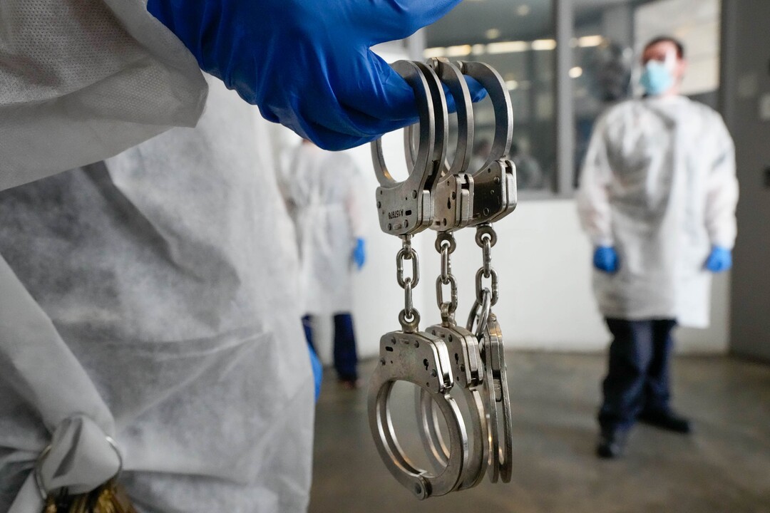 (Francisco Kjolseth | The Salt Lake Tribune) Prison guards prepare to help staff from Nomi Health, the direct healthcare company coordinating COVID-19 testing and vaccination efforts across the country and Utah Department of Corrections, as they collaborate to provide the COVID-19 vaccine for incoming inmates interested in the shot at the Utah State Prison in Draper, on Tuesday, July 27, 2021.