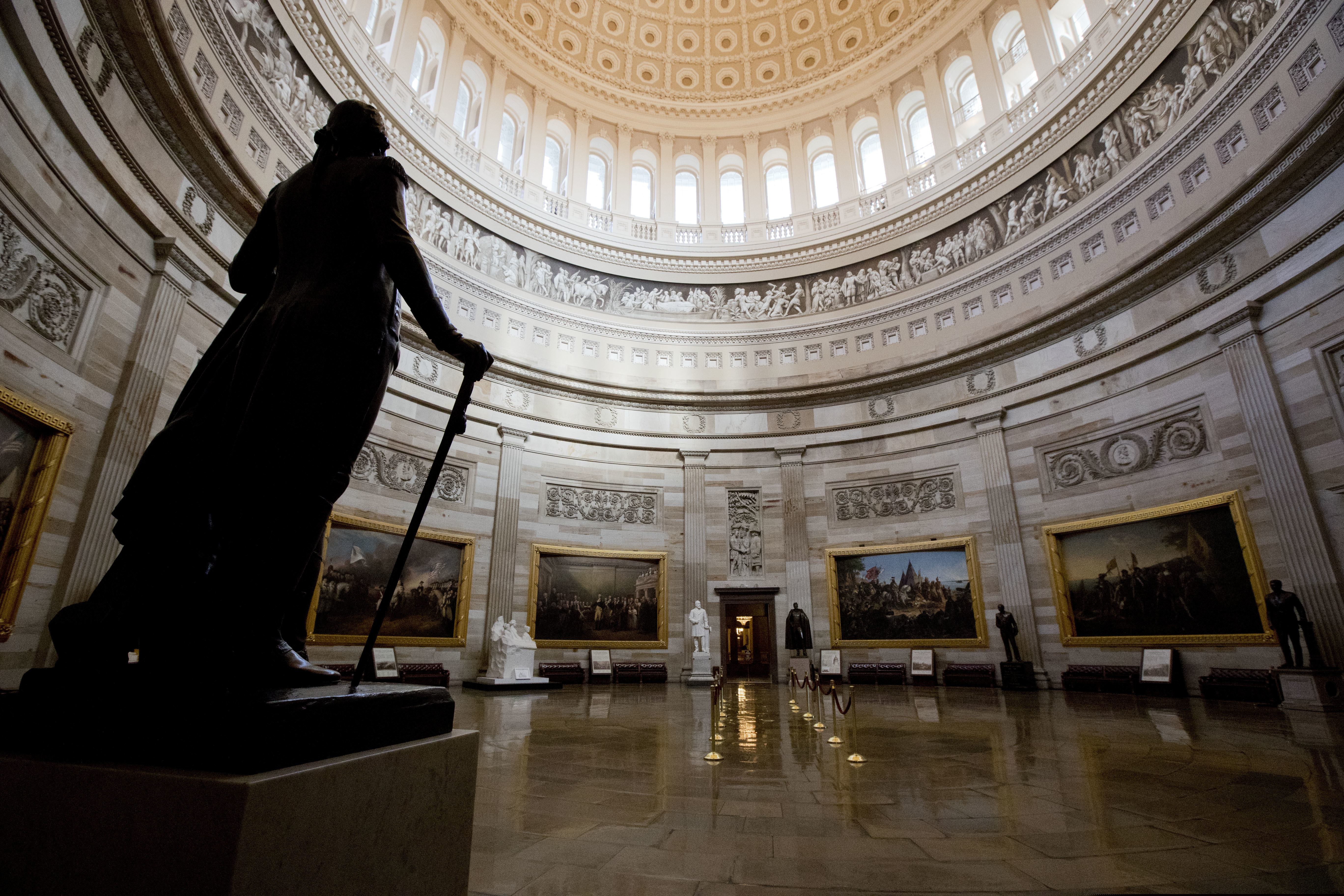 (Manuel Balce Ceneta | The Associated Press) The empty U.S. Capitol Rotunda is seen in Washington during a partial government shutdown Monday, Dec. 24, 2018. Both sides in the long-running fight over funding President Donald Trump's U.S.-Mexico border wall appear to have moved toward each other, but a shutdown of one-fourth of the federal government entered Christmas without a clear resolution in sight.