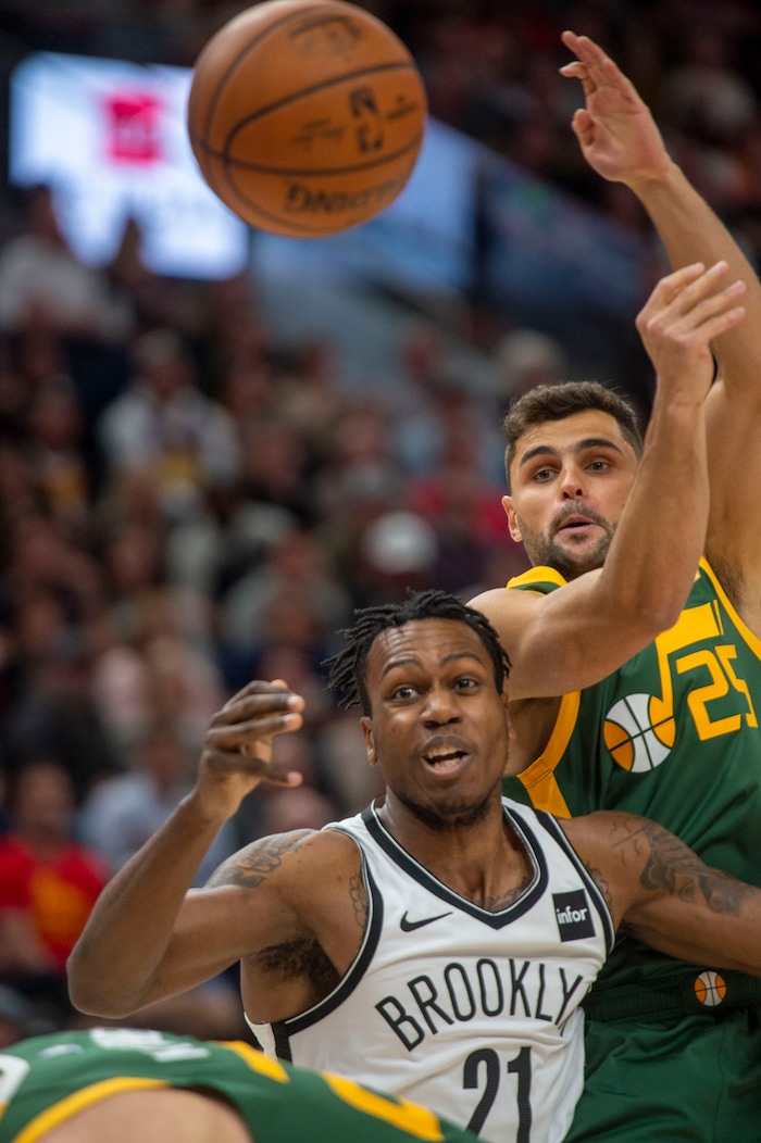 (Rick Egan  |  The Salt Lake Tribune)  Utah Jazz guard Raul Neto (25) goes for a loose ball along with Brooklyn Nets guard Treveon Graham (21), in NBA action between Utah Jazz and Brooklyn Nets, at  Vivint Smart Home Arena, Saturday, March 17, 2019.



