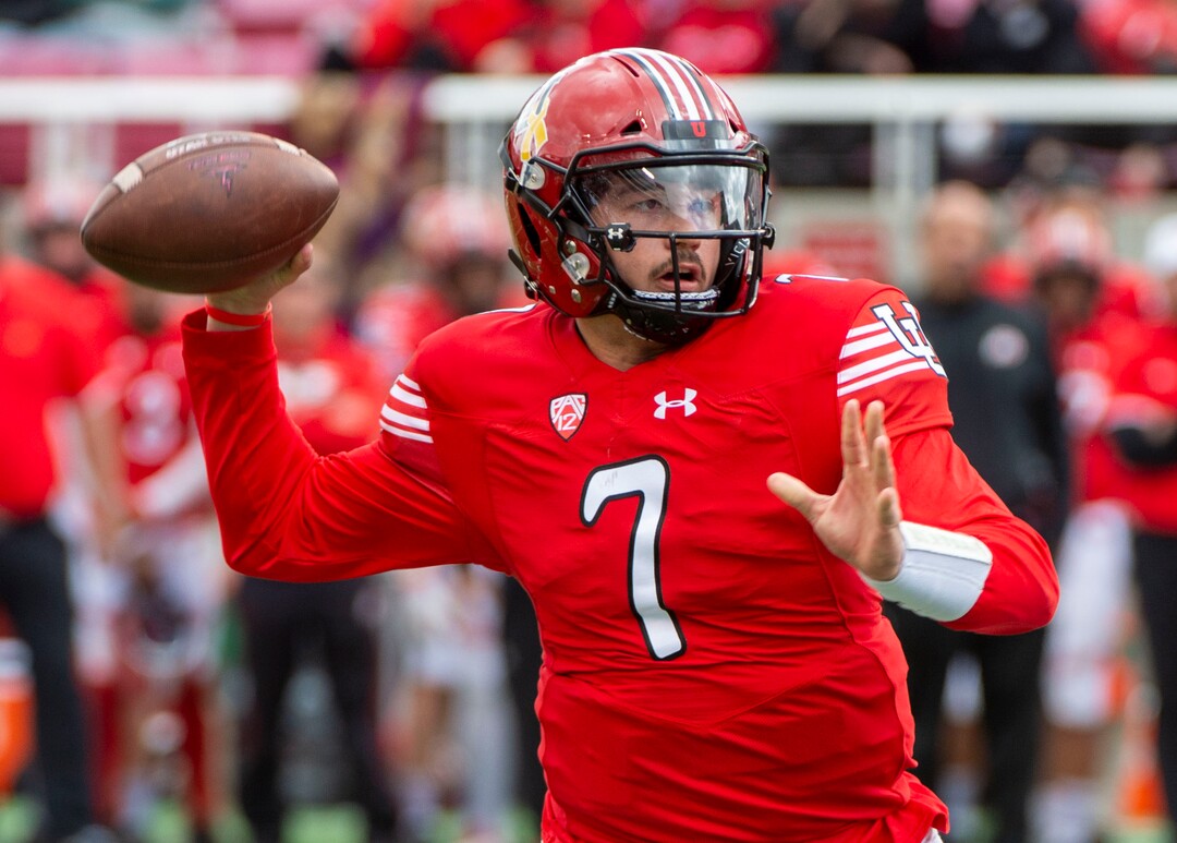 (Rick Egan  |  The Salt Lake Tribune)  Quarterback Cameron Rising looks for a receiver, in Utah's spring Red-White game at Rice-Eccles Stadium, Saturday, April 13, 2019.