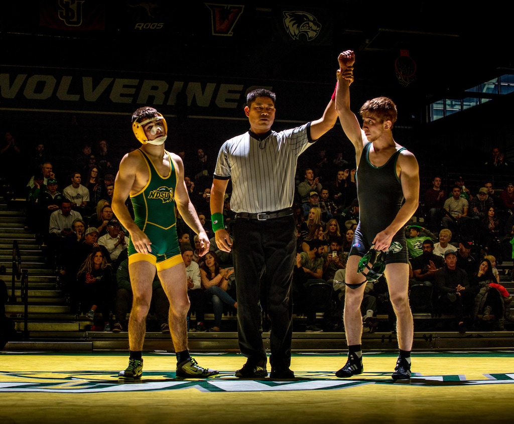 (Photo courtesy Jay Drowns / UVU Marketing: Utah Valley University's Taylor LaMont (right) against the North Dakota State University Bison in the Lockhart Arena on the UVU Campus in Orem, Utah on Friday, Dec. 14, 2017.