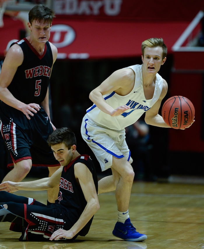 (Francisco Kjolseth  |  The Salt Lake Tribune)  Weber vs Pleasant Grove, 6A State high school basketball tournament at the Huntsman Center in Salt Lake City, Thursday March 1, 2018. Pleasant Grove's Jacob Pincock (4) recovers control of the ball over Weber. 