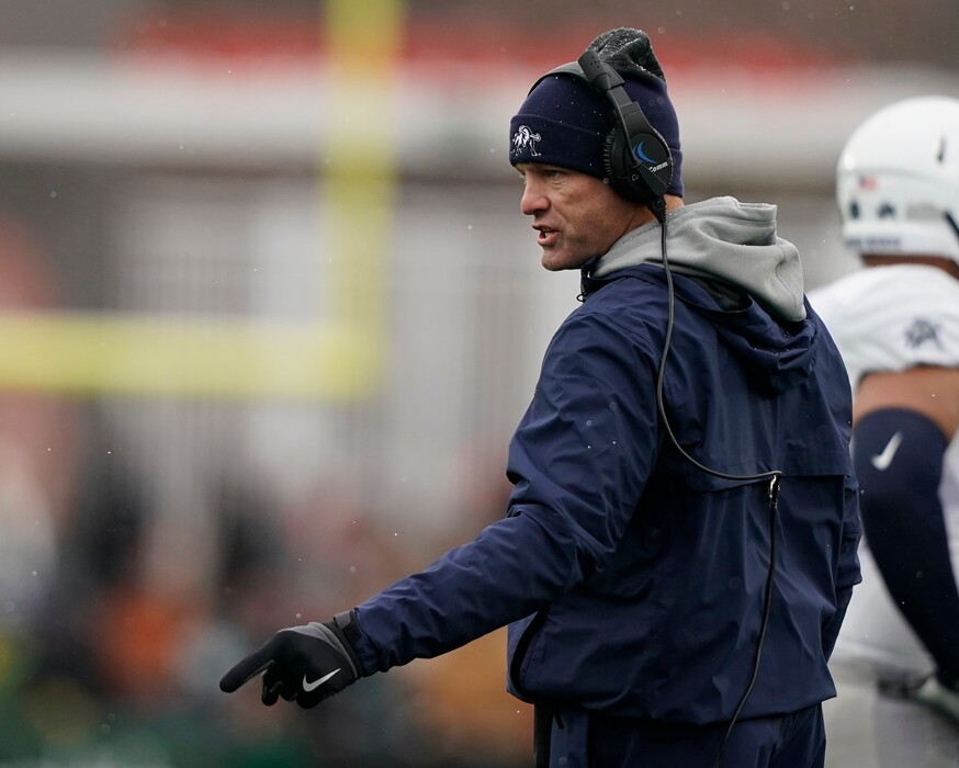 Utah State head coach Matt Wells argues a call with the officiating crew during the first half of an NCAA football game against Colorado State, Saturday, Nov. 17, 2018, in Fort Collins, Colo. (AP Photo/Jack Dempsey)