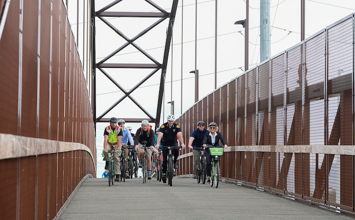 (Francisco Kjolseth | The Salt Lake Tribune) Salt Lake City Mayor Jackie Biskupski is joined by Police Chief Mike Brown, members of the public and city employees on Thursday, May 16, 2019, as part of the annual MayorÕs Bike to Work Day. This yearÕs ride began at the Northwest Recreation Center and ran primarily along the Jordan River Trail in an effort to show off the investments the city and others have made to the trail including the new 120-foot arch bridge that connects the north and south sides of the trail between 200 South and North Temple.
