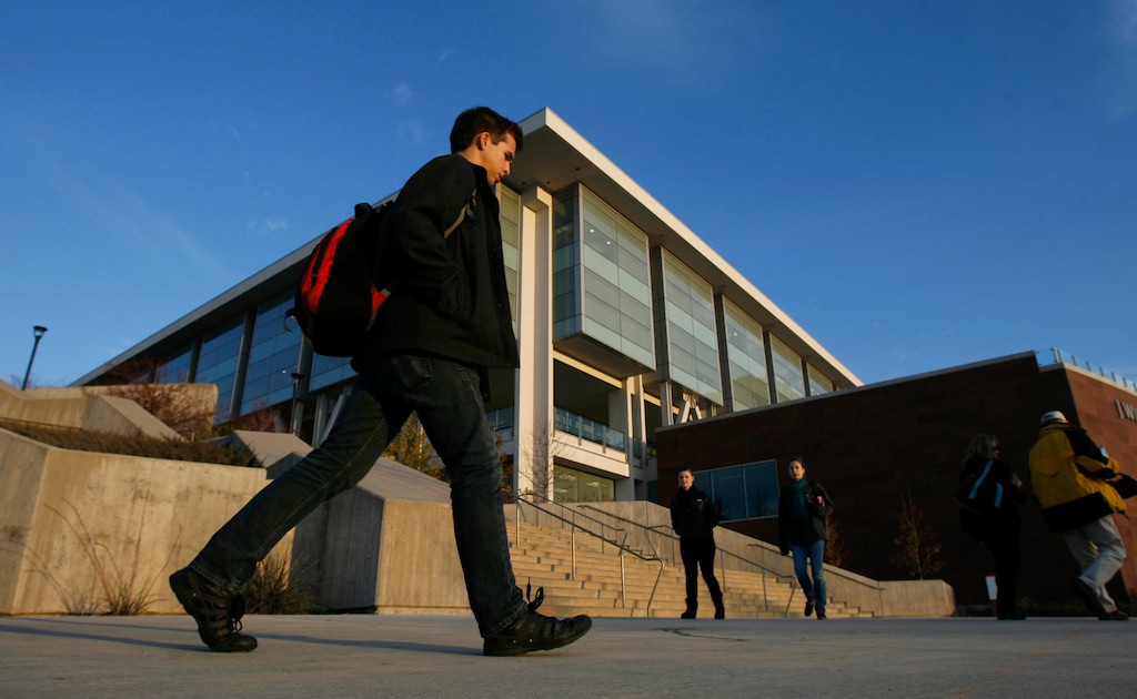(Francisco Kjolseth  |  Tribune file photo) Students file out of the J. Willard Marriott Library on the University of Utah campus.