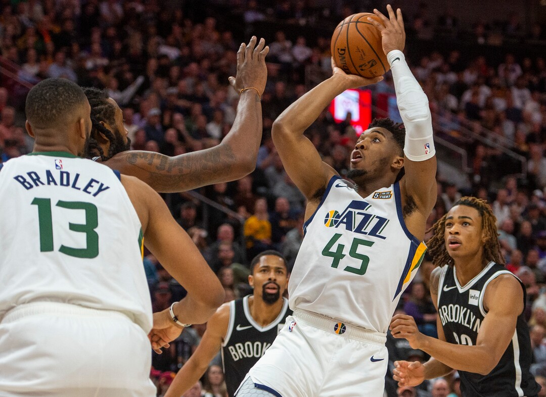 (Rick Egan  |  The Salt Lake Tribune)        Utah Jazz guard Donovan Mitchell (45) takes a shot for the Jazz, in NBA basketball action between the Utah Jazz and the Brooklyn Nets in Salt Lake City, Tuesday, Nov 12, 2019.