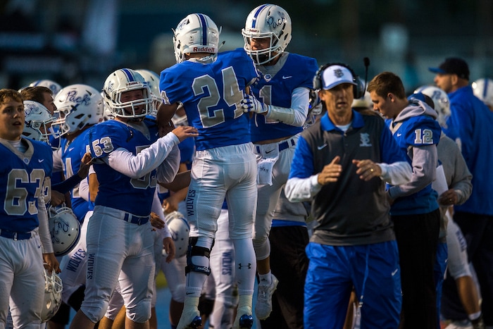 (Chris Detrick  |  The Salt Lake Tribune)  Fremont's Griffin Rhees (24) and Fremont's Wyatt Tuckett (1) celebrate Rhees' touchdown during the game at Fremont High School Thursday, October 5, 2017. 