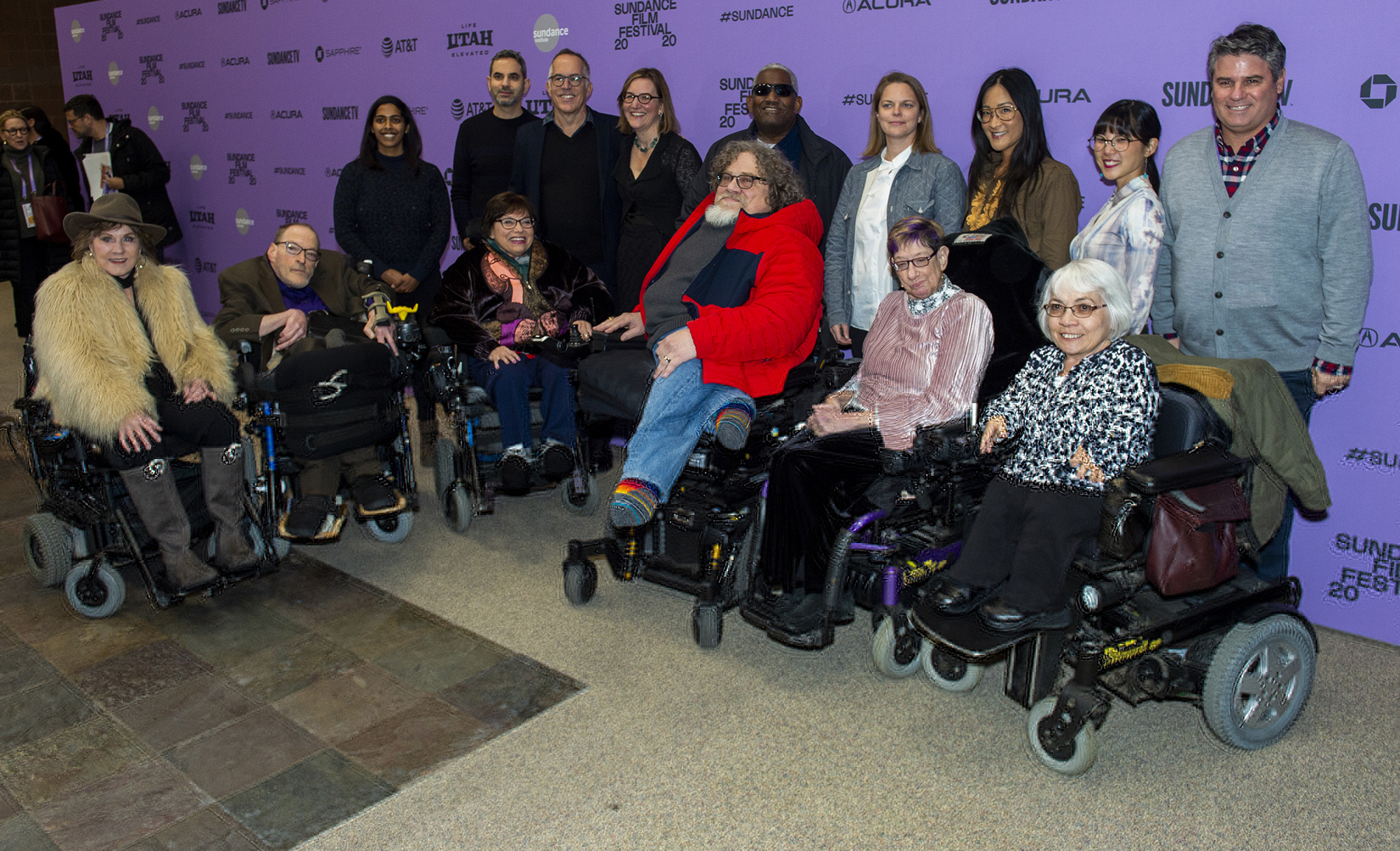 (Rick Egan  |  The Salt Lake Tribune)     Subjects gather together with Nicole Newnhan, director/producer, and Jim LeBrecht director/producer/subject, on the red carpet for the film "Crip Camp", the opening night film of the 2020 Sundance Film Festival, at the Eccles Theatre in Park City, Thursday, Jan. 23, 2020.