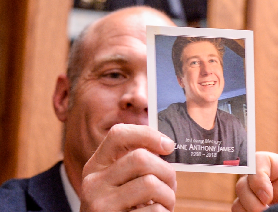 (Leah Hogsten  |  The Salt Lake Tribune)  Aaron James holds a photograph of his son, Zane James Thursday. The James' and their attorney Bob Sykes have filed a civil rights complaint, May 16, 2019, alleging excessive force was used by Cottonwood Heights Police Department officer in the fatal shooting of their son, 19-year-old Zane James on May 29, 2018.