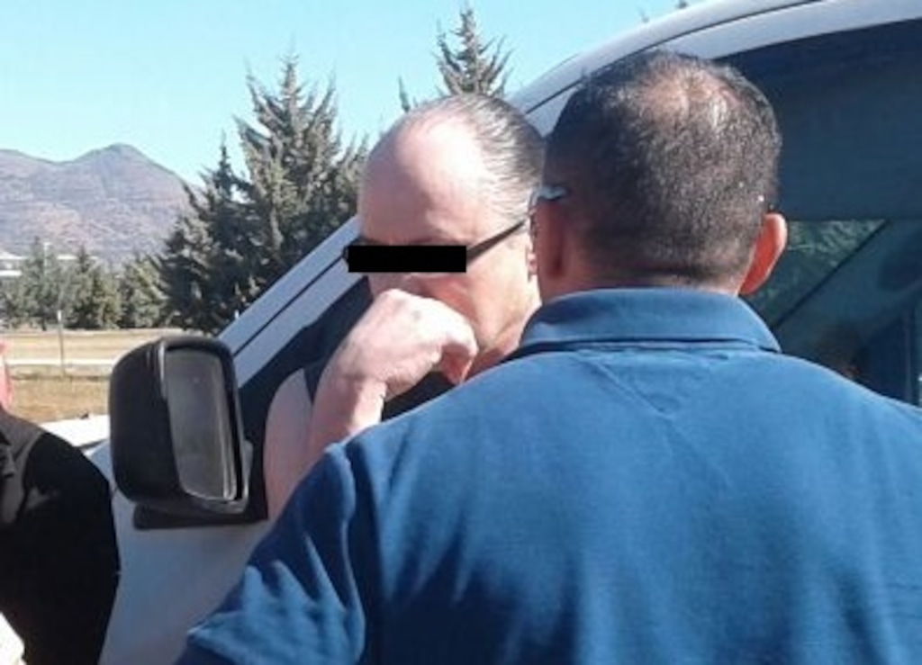 In this photo provided with a redaction by the law enforcement in the Mexican state of Chihuahua, Orson William Black, 56, stands while being detained Nov. 5, 2017. Black is a former member of the polygamous Fundamentalist Church of Jesus Christ of Latter-Day Saints who has been on the run from child sex abuse charges in Arizona since 2003. Courtesy Photo.