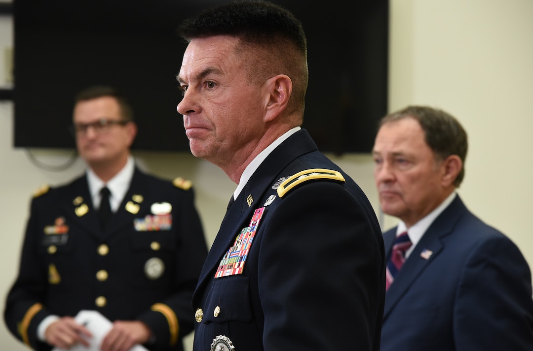 (Francisco Kjolseth  |  The Salt Lake Tribune)  Maj. Gen. Jefferson S. Burton, center, and Gov. Gary R. Herbert, at right, address the media on Sunday, Nov. 4, 2018, in Draper, UT, regarding the recent death of North Ogden Mayor Brent Taylor a major in the Utah National Guard, killed in Afghanistan in an apparent insider attack.