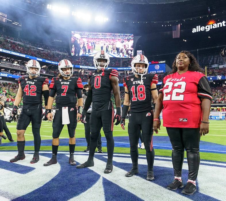 (Leah Hogsten | The Salt Lake Tribune) Donna Lowe-Stern, mother of Aaron Lowe who was shot and killed in September, served as an honorary captain for the coin toss at the start of the University of Utah game against the Oregon Ducks for the 2021 Pac12 Football Championship at Allegiant Stadium in Las Vegas, Dec 3, 2021.